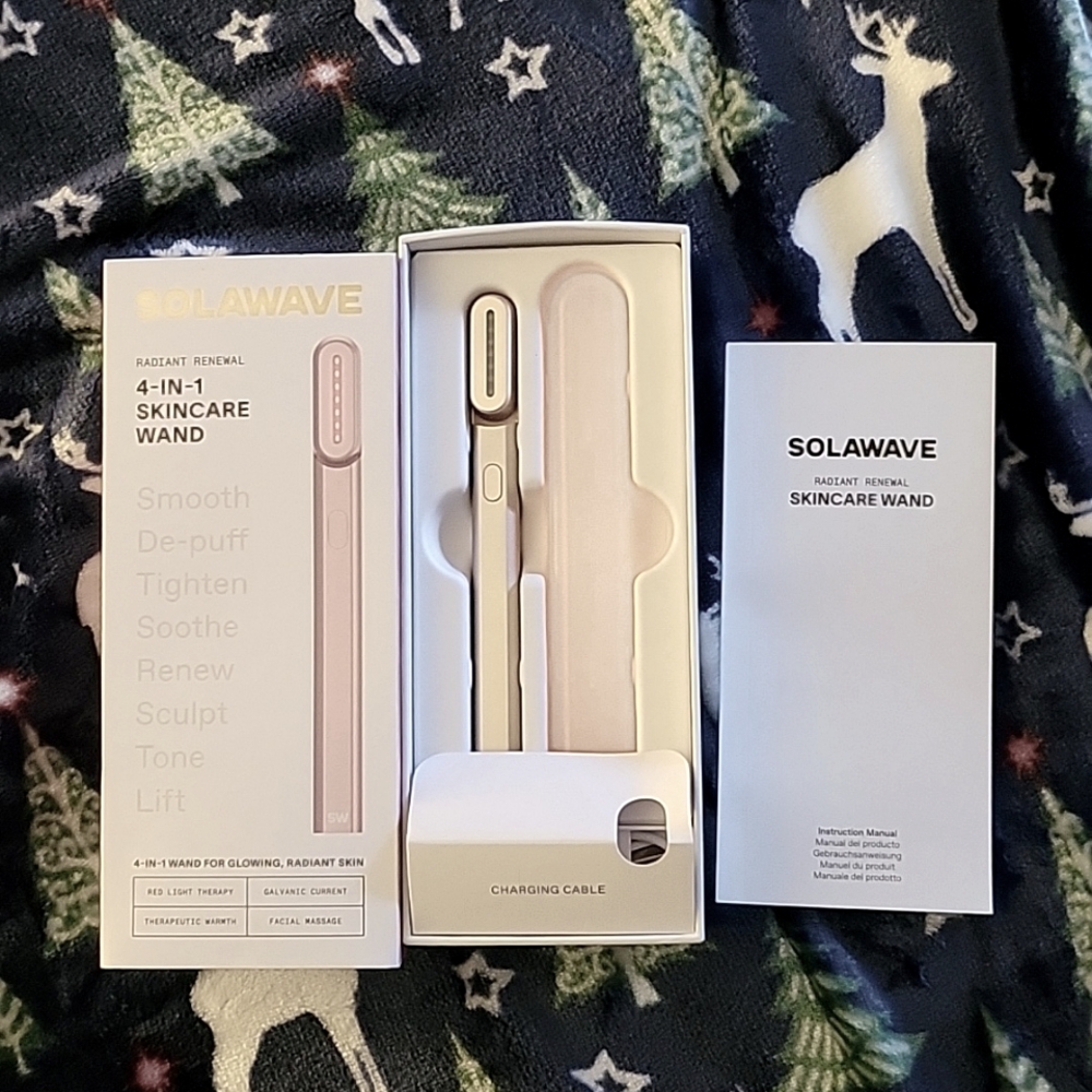 Solowave 4-in-1 Skincare Wand. Barely used. Includes, Wand. Carry Case. Charger